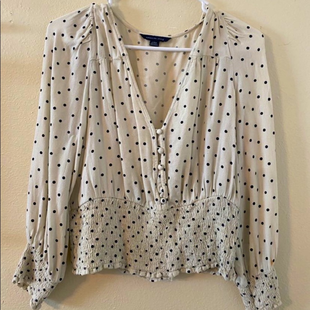 white and black polka dot american eagle top